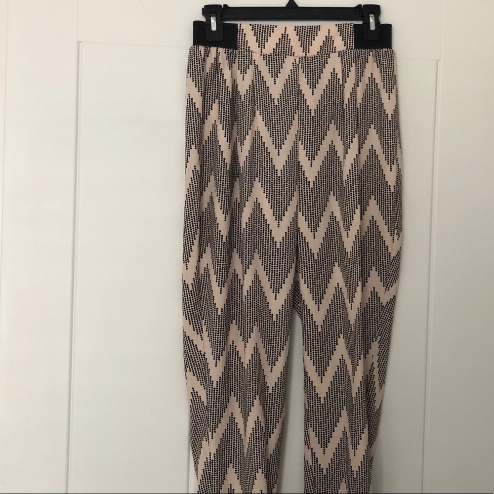 Loose pants with gathered ankles